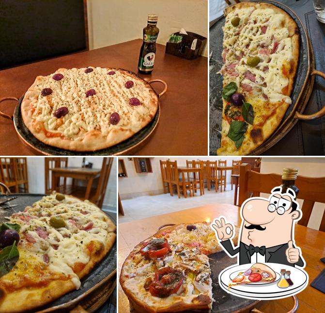 Peça pizza no Artesão Restaurante E Pizzaria