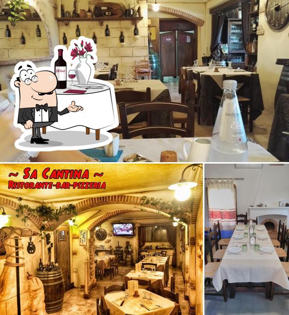 La immagine della tavolo da pranzo e interni di Sa Cantina - Ristorante - Bar - Pizzeria