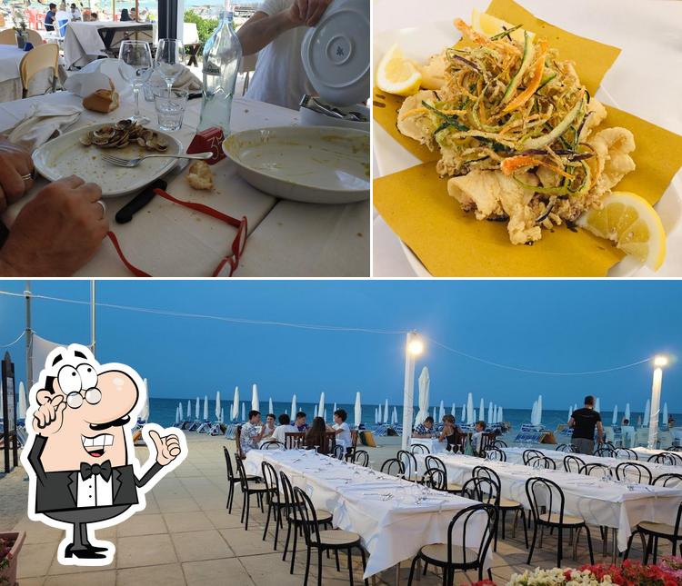 Questa è la foto che presenta la interni e cibo di Esabeach Chalet