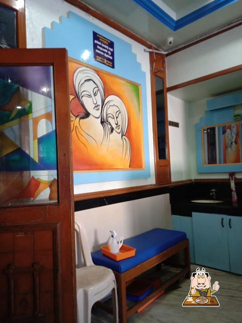 Try out pizza at Sri Lakshmi Nivash