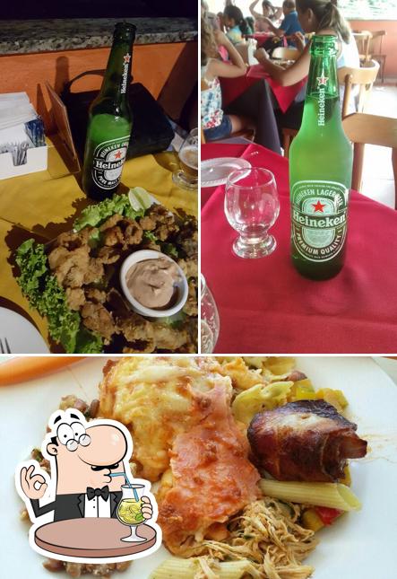 A imagem da bebida e comida no Churrascaria Norma's