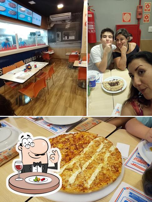 O Domino's Pizza - Santos Marechal se destaca pelo comida e interior