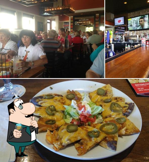 The picture of bar counter and food at Chili's Grill & Bar