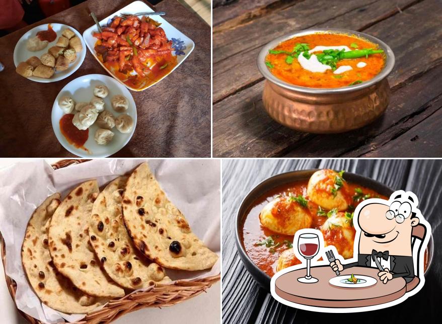 Meals at Meenal Restaurant Aloo Paratha Paneer Paratha Mooli Paratha Gobhi Paratha Veg Momos Paneer Momos Spring Roll Lunch