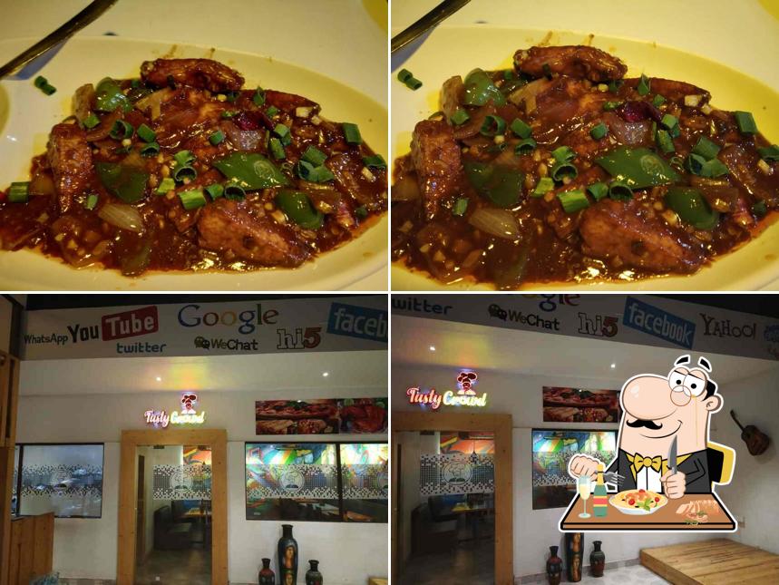 Among different things one can find food and drink at Tasty Crowd Restaurant & Cafe