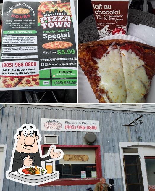 Check out the image depicting food and interior at Blackstock Pizzatown