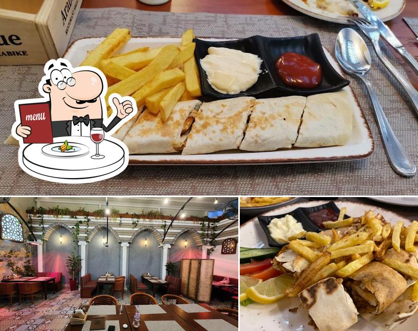 Check out the picture showing food and interior at Restorant Arabesque الذوق العربي