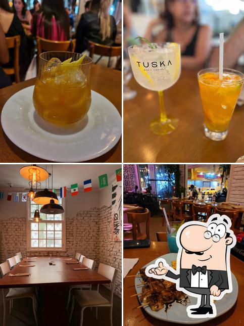Esta é a imagem mostrando interior e bebida no Tuska Bar