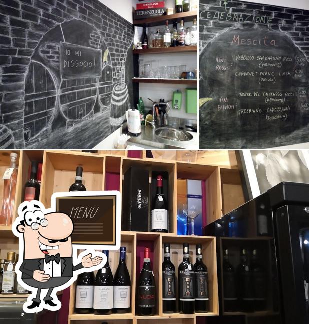 La foto della lavagna e alcol di Enoteca Mostoqui