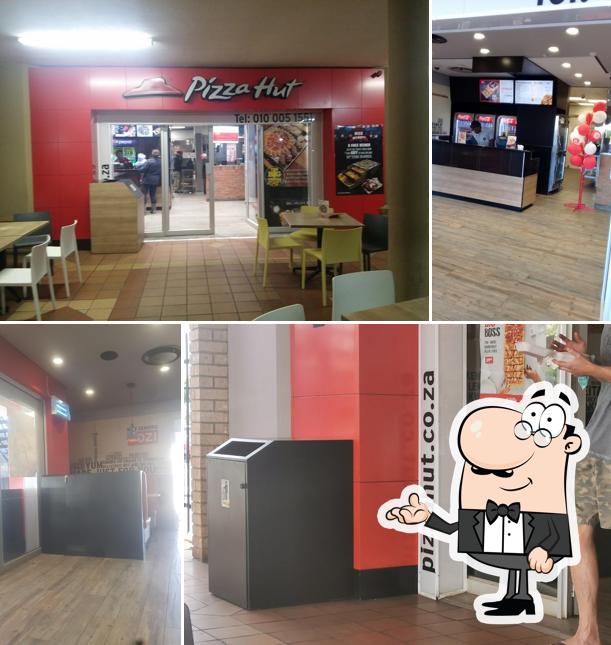 Installez-vous à l'une des tables de Pizza Hut Highveld