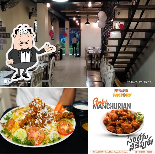 Take a seat at one of the tables at The Food Factory Best Restaurants In Kakinada