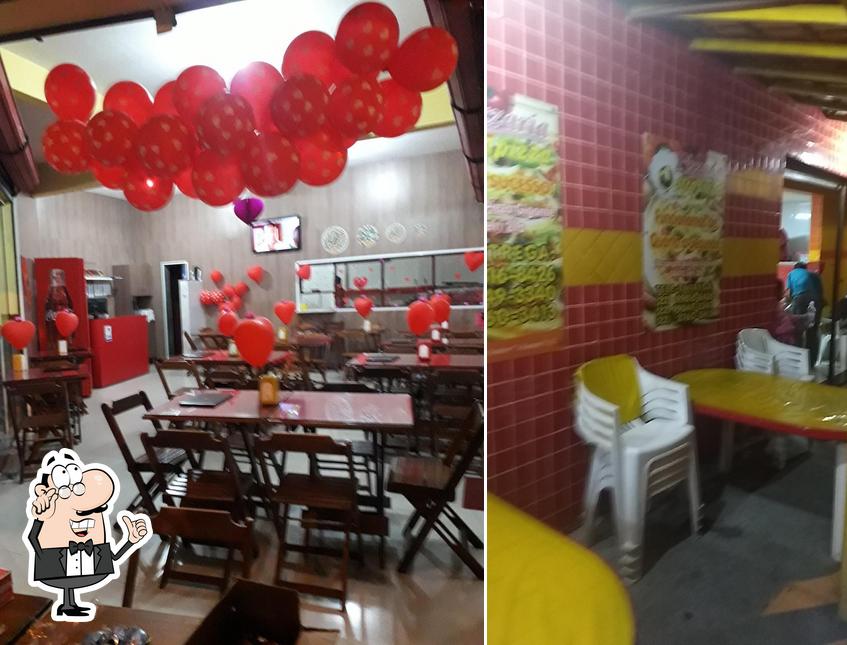 O interior do pizzaria ( Ostra Pizza )