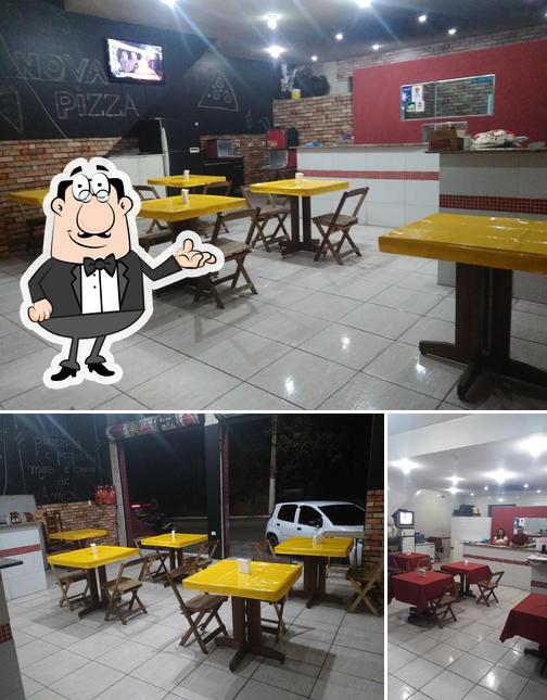 O interior do Pizzaria Nova Pizza