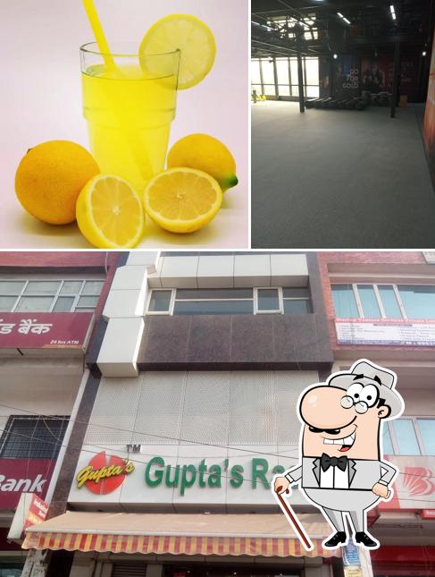 The picture of exterior and beverage at Flavours By GUPTA'S RASOI