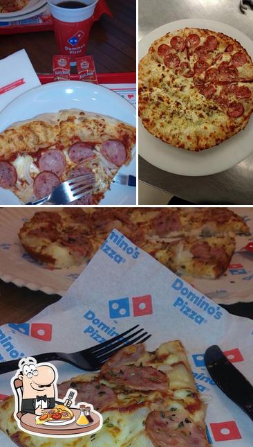 No Domino's Pizza - Mesquita, você pode desfrutar de pizza