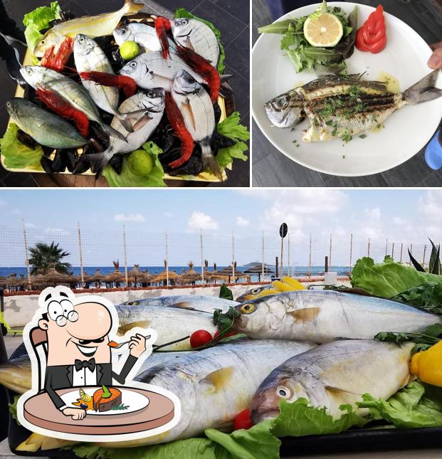 Tropicana Ristorante di pesce- Lounge Bar €€ serve un menu per gli amanti dei piatti di mare