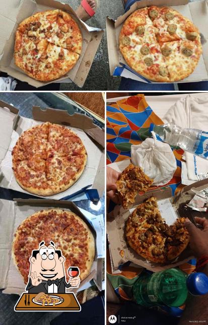 Try out pizza at Domino's Pizza