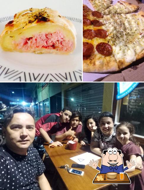 A foto a Franco's Pizza’s comida e interior
