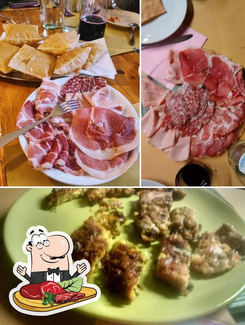 Prenditi i un pasto a base di carne a osteria laghi seta, prunt da magner