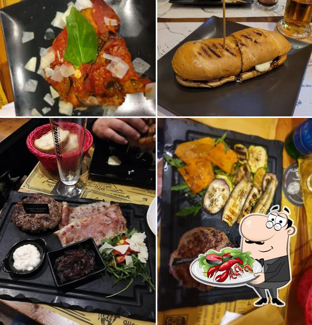 Prenditi la cucina di mare a Guest House Pub