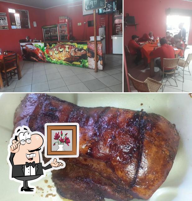 A foto do Restaurante e frangaria z grau’s interior e comida