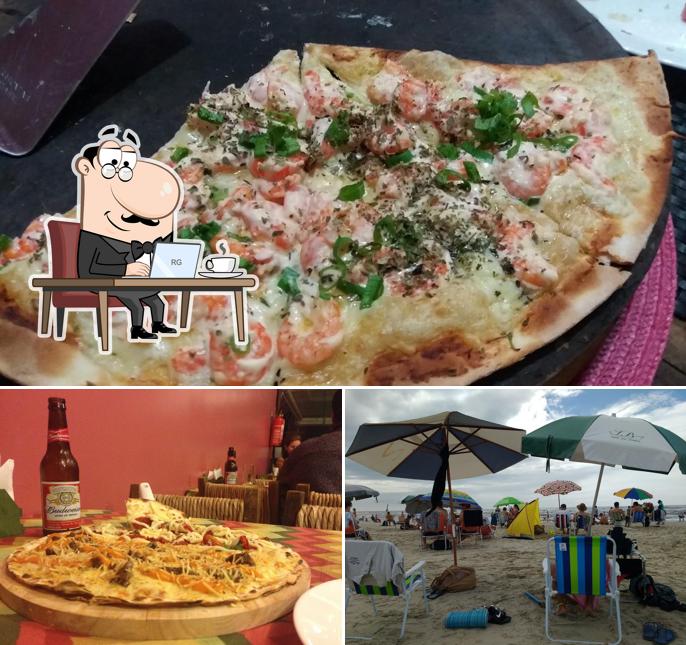 A ilustração a Pizzaria da Praia’s interior e comida