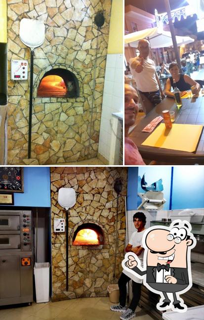 Gli interni di Il Vespro Pizzeria Rosticceria da Asporto