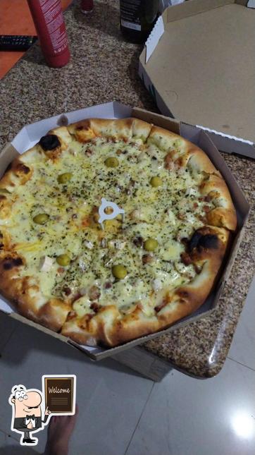 Look at the photo of Pizzaria do Paulista