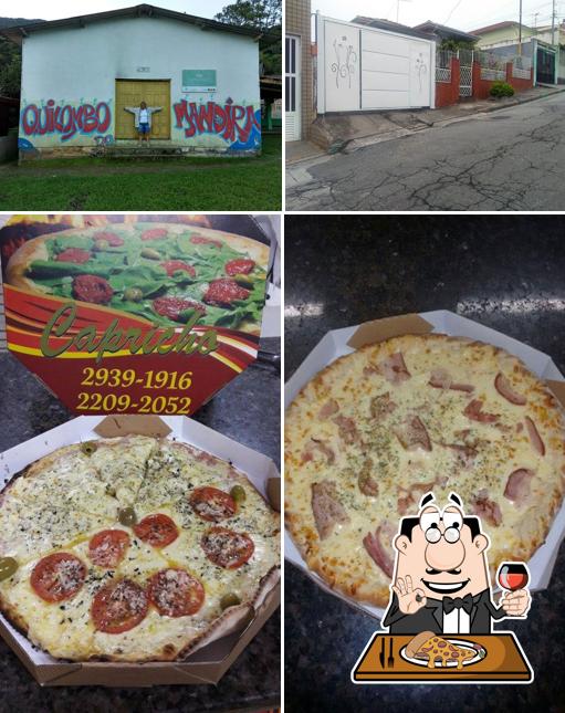 No Pizzaria capricho vila gustavo, você pode desfrutar de pizza