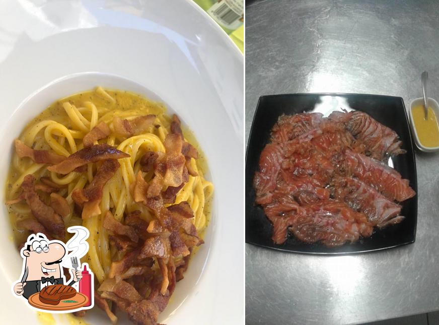 Prenditi i piatti di carne a Osteria Rive Grande