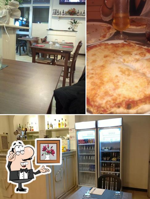 Dai un’occhiata alla immagine che presenta la interni e pizza di Pizzeria De Gustibus