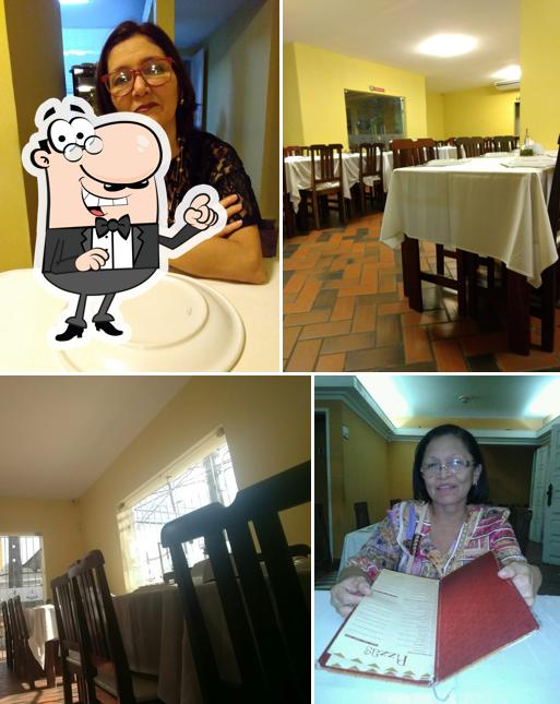 O interior do Pizzaria Reis Magos