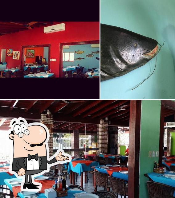 The photo of interior and seafood at Dom Chico