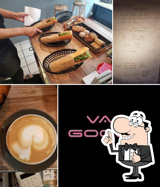 Look at the image of Van Gogo's Cafe + banh mi