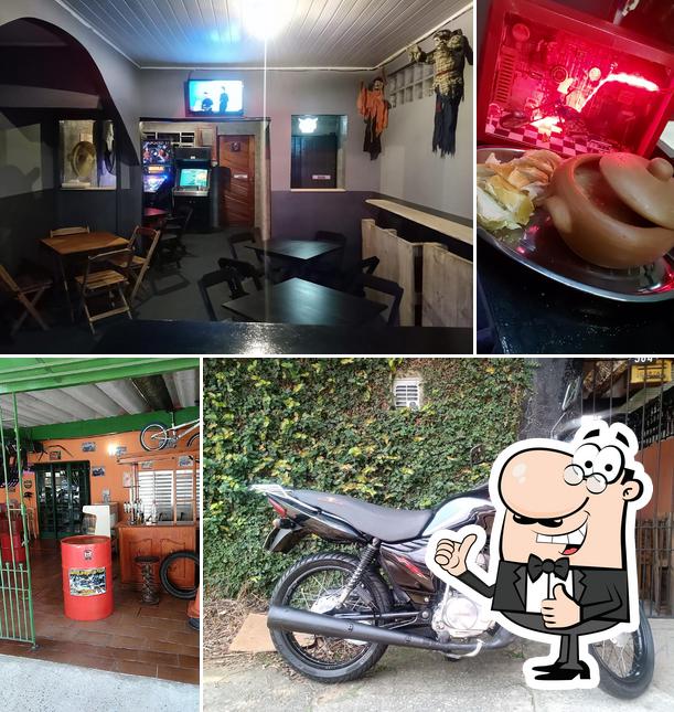 Here's an image of Garagem do Jhonny Bar/Lavagem e Oficina geral de Motos