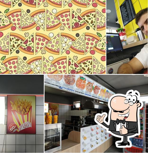 Здесь можно посмотреть фотографию пиццерии "Pizza Shop"