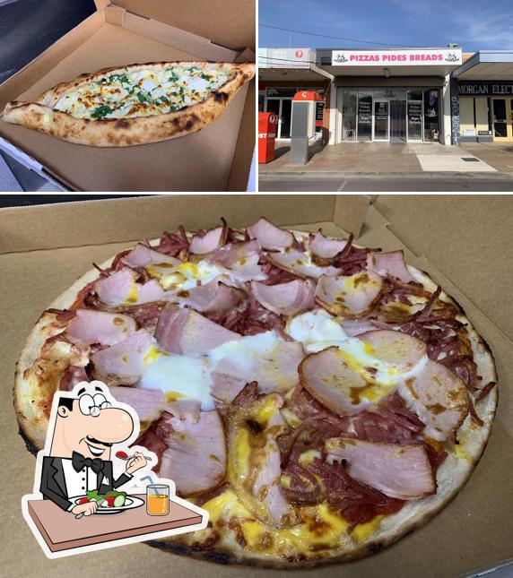 Las imágenes de comida y exterior en Pizza Mob