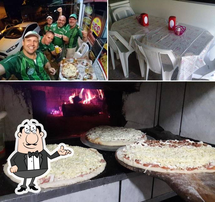 A foto da interior e comida a Tuto Bonna Pizzaria