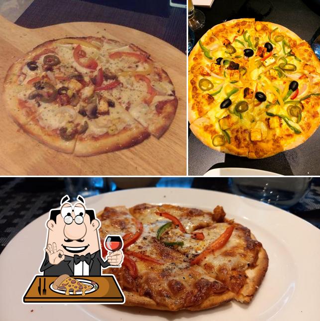 Try out pizza at Indore Kitchen