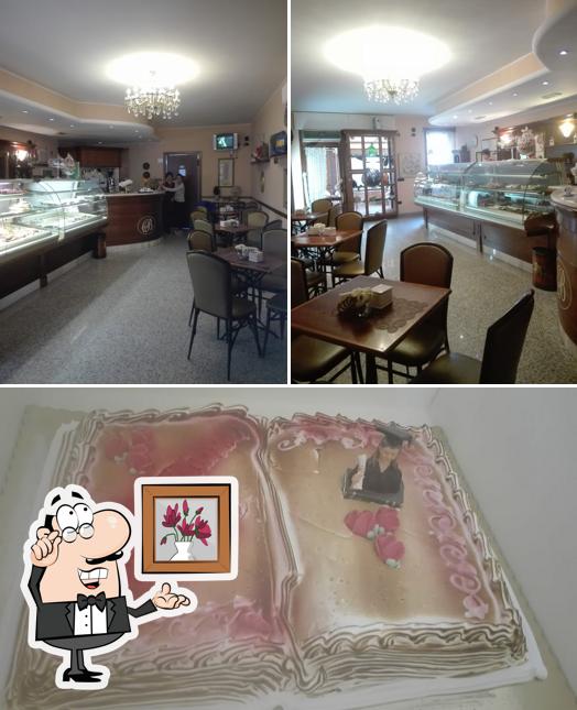 Tra le diverse cose da Pasticceria Caffetteria Cesaracciu Baule Snc si possono trovare la interni e cibo