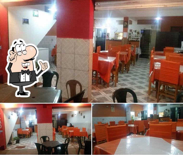 Veja imagens do interior do Pizzaria Victória