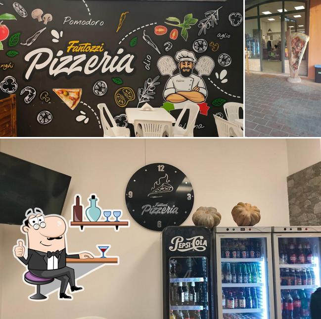 La foto di interni e cibo da PizzeriaFANTOZZI