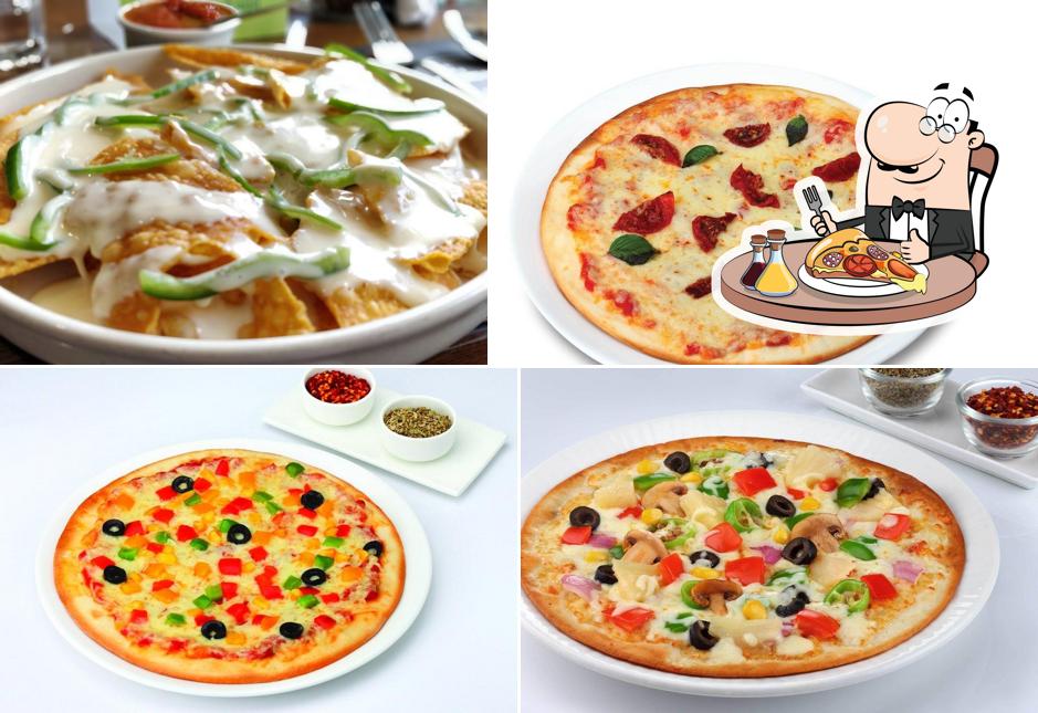 Try out pizza at Cream Centre
