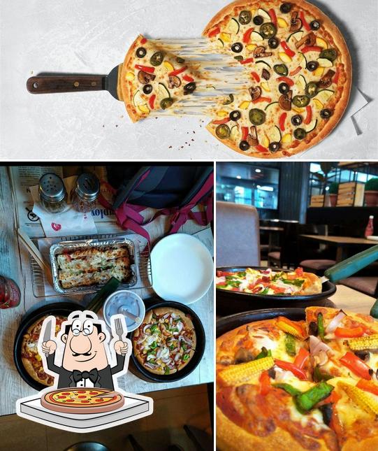 Try out pizza at Pizza Hut Lajpat Nagar, New Delhi