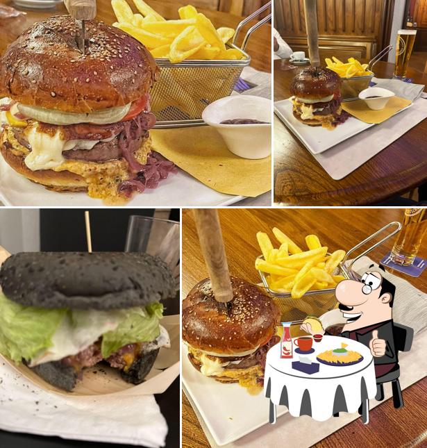 Prova un hamburger a Braceria Zur Traube Restaurant Grill und Wine Bar