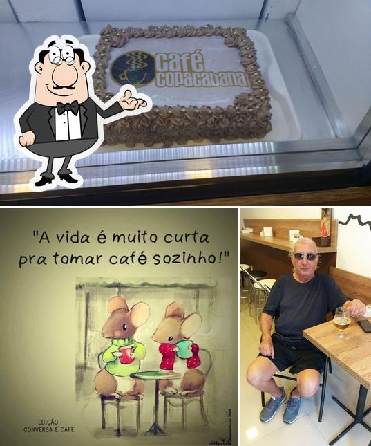 Entre diversos coisas, interior e bolo podem ser encontrados a Café Copacabana