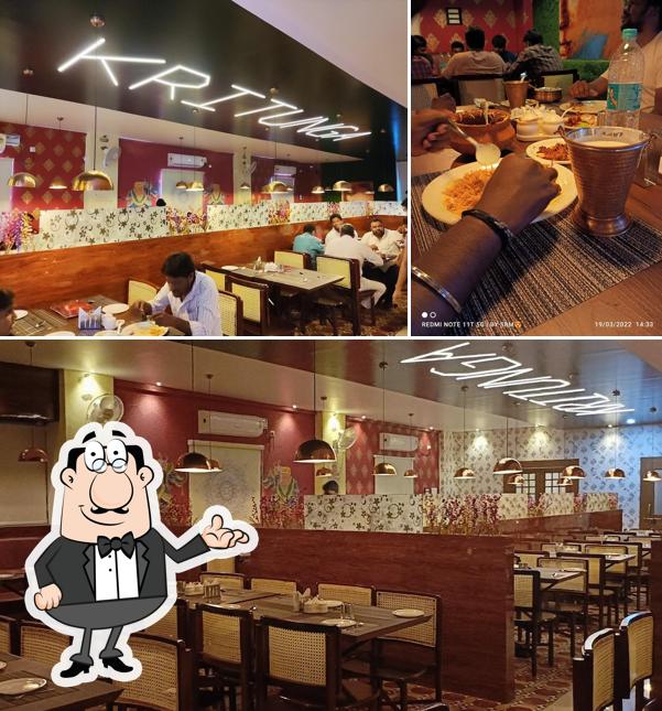 Take a seat at one of the tables at KRITUNGA FAMILY RESTAURANT