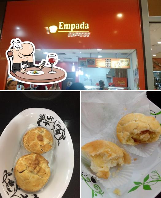 Dê uma olhada a foto ilustrando comida e interior no Empada Express