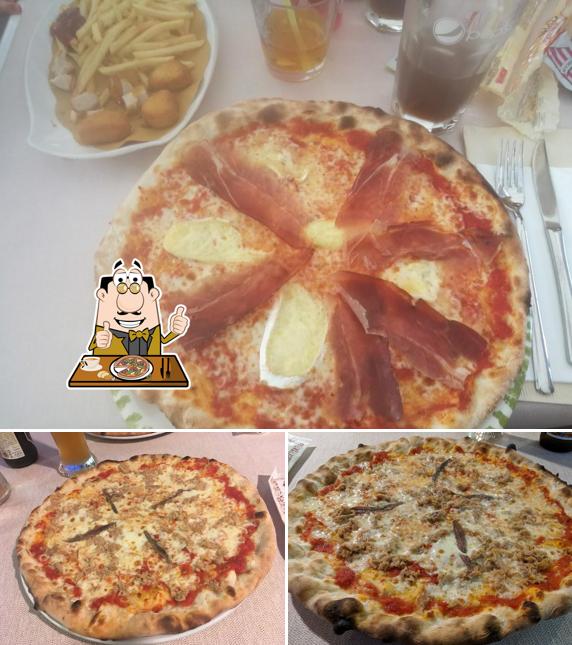 A Ristorante - Pizzeria “Da Giulia”, puoi goderti una bella pizza