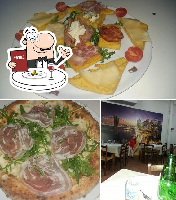 Dai un’occhiata alla foto che raffigura la cibo e tavolo da pranzo di Pizzeria Eclisse